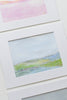 Original abstract landscape in soft colors with tiny flower speckles.
