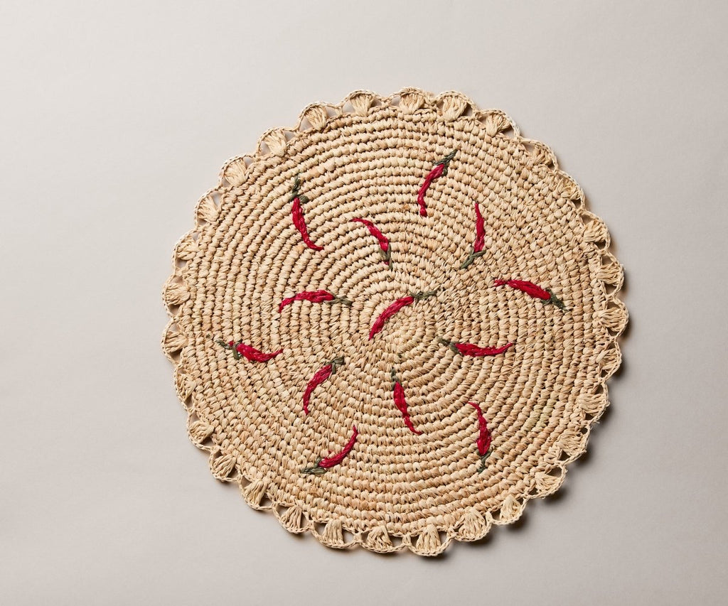 Scattered Chili Handwoven Raffia Round Placemat – Artisan Table Décor - Liza Pruitt