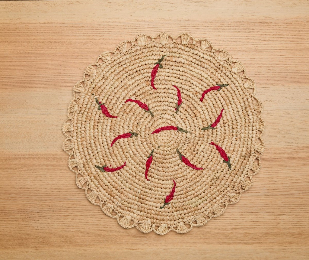 Scattered Chili Handwoven Raffia Round Placemat – Artisan Table Décor - Liza Pruitt