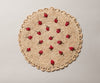 Scattered Strawberry Hand - Crocheted Raffia Palm Round Placemat - Liza Pruitt