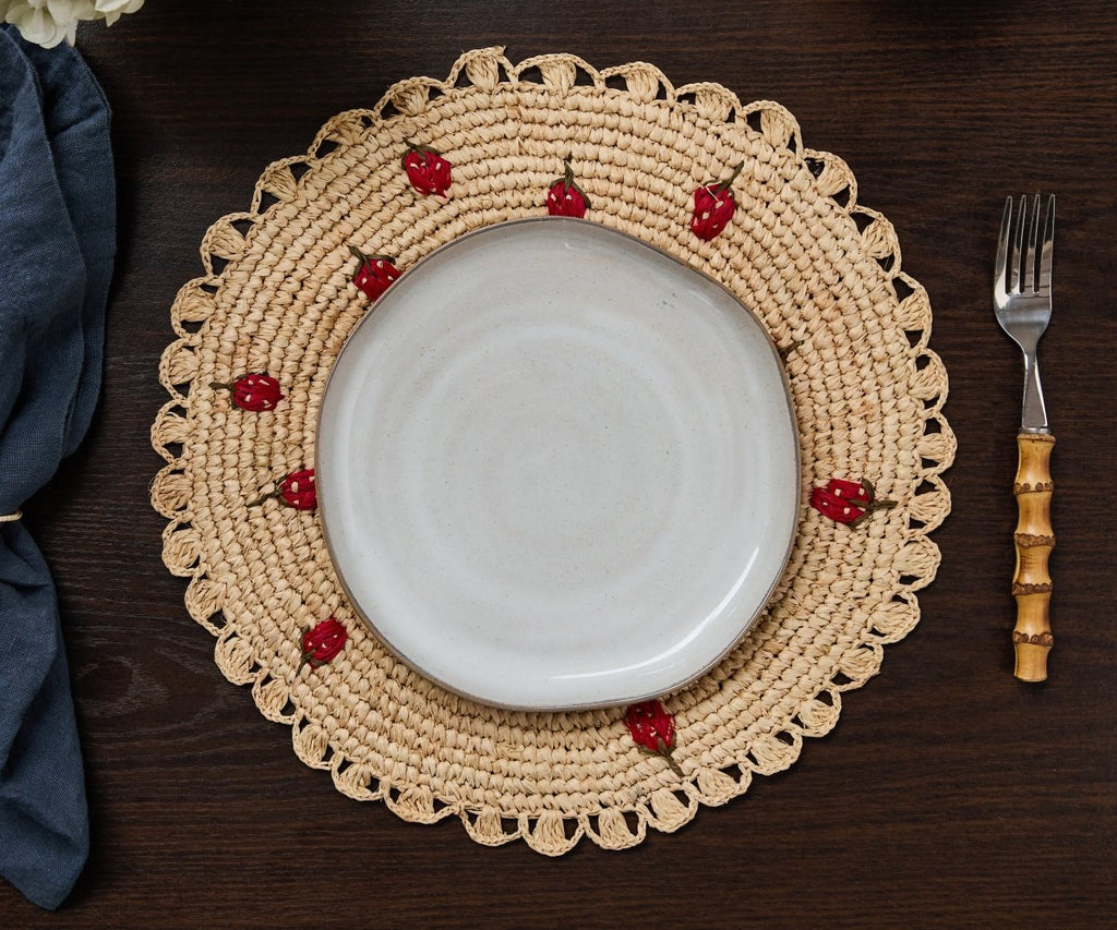 Scattered Strawberry Hand - Crocheted Raffia Palm Round Placemat - Liza Pruitt