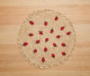 Scattered Strawberry Hand - Crocheted Raffia Palm Round Placemat - Liza Pruitt